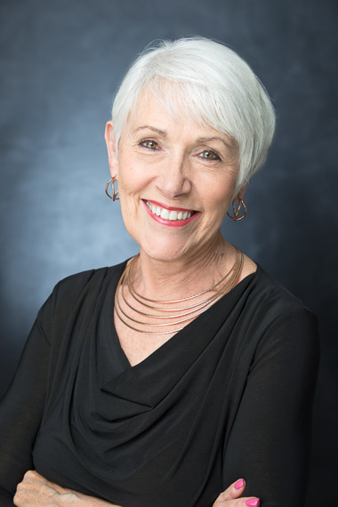 older woman headshot photo in studio